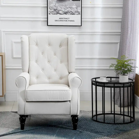 Fauteuil d'appoint capitonné avec dossier haut à oreilles, accoudoirs rembourrés arrondis et assise épaisse rembourrée