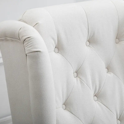Fauteuil d'appoint capitonné avec dossier haut à oreilles, accoudoirs rembourrés arrondis et assise épaisse rembourrée