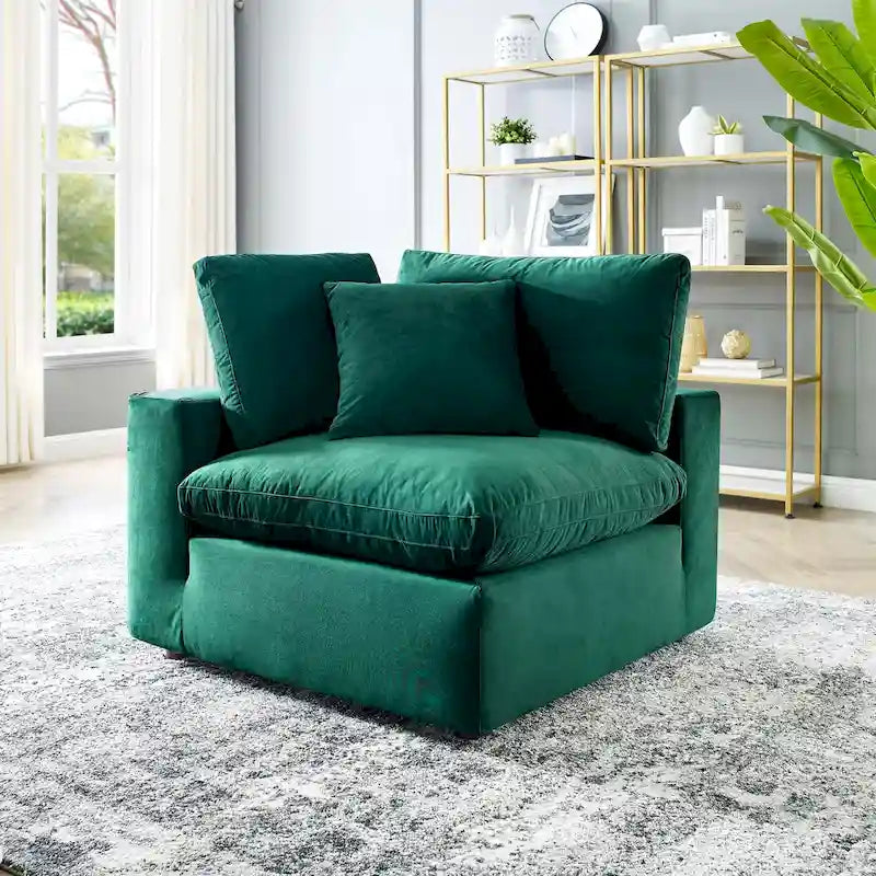 Fauteuil d'angle Commix en velours performant, rembourré de duvet et ultra-confortable