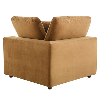 Fauteuil d'angle Commix en velours performant, rembourré de duvet et ultra-confortable