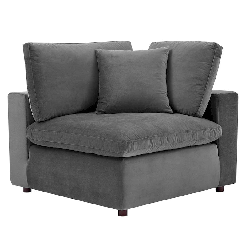 Fauteuil d'angle Commix en velours performant, rembourré de duvet et ultra-confortable