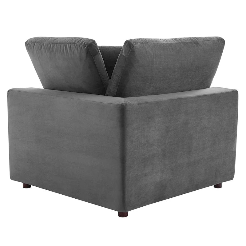 Fauteuil d'angle Commix en velours performant, rembourré de duvet et ultra-confortable