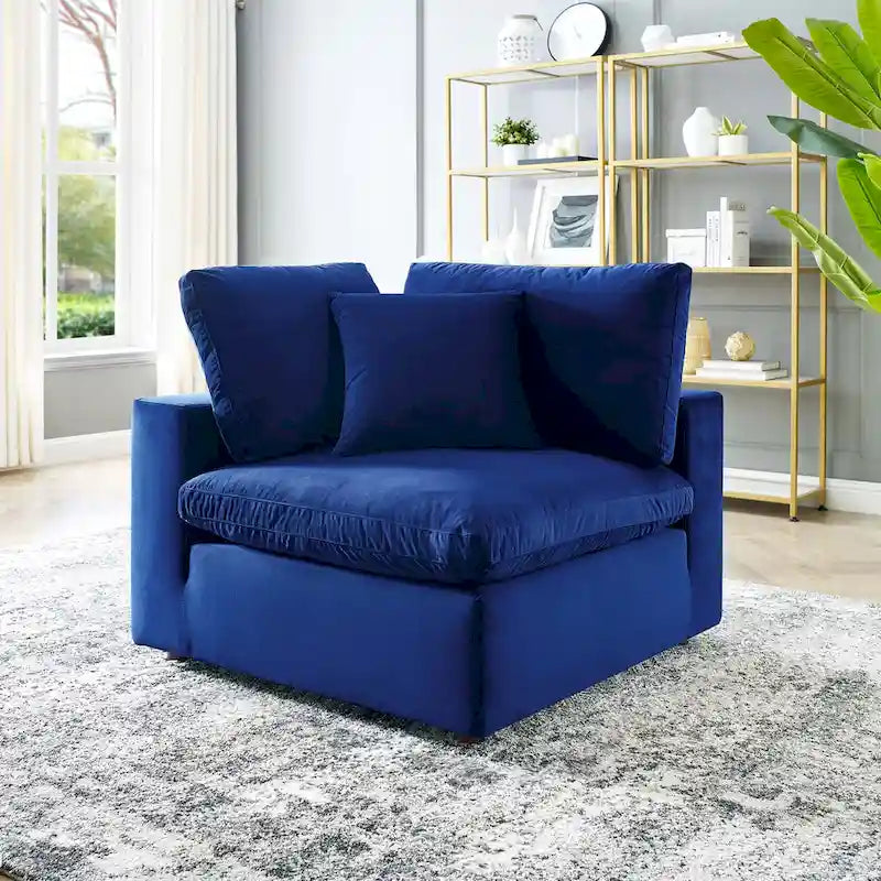 Fauteuil d'angle Commix en velours performant, rembourré de duvet et ultra-confortable