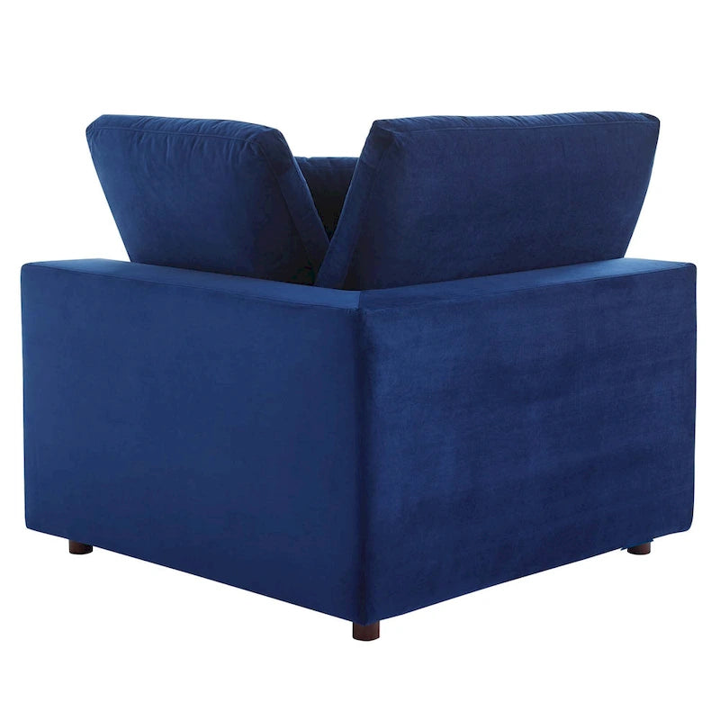 Fauteuil d'angle Commix en velours performant, rembourré de duvet et ultra-confortable