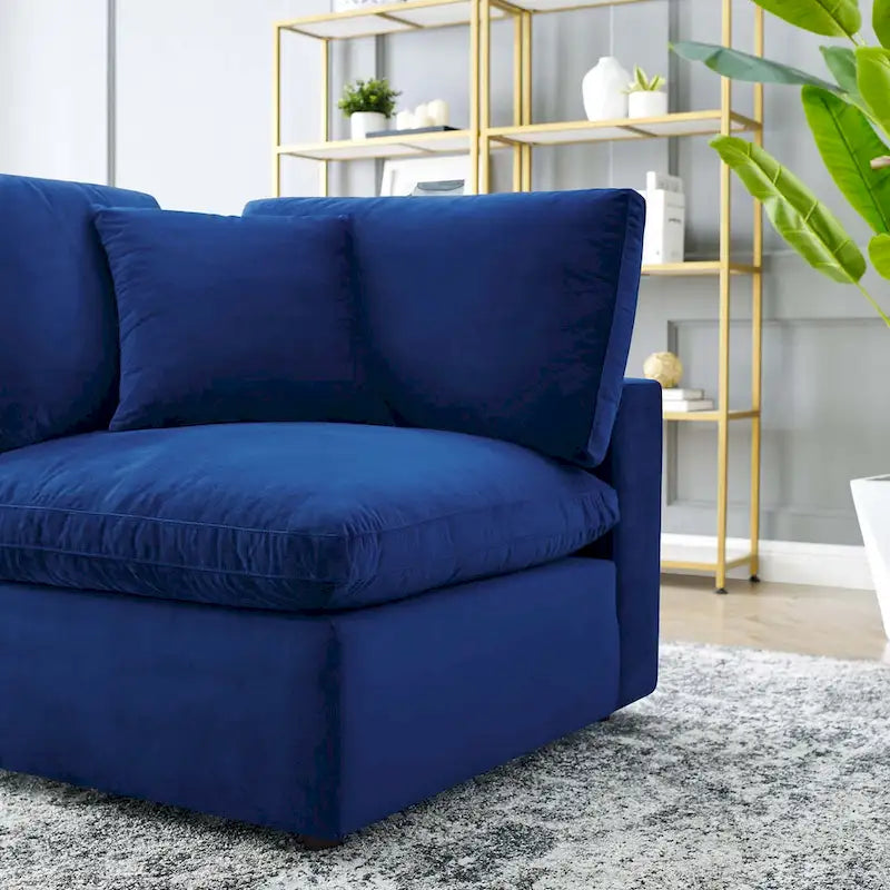 Fauteuil d'angle Commix en velours performant, rembourré de duvet et ultra-confortable