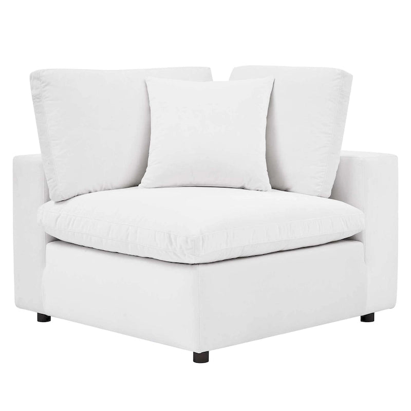 Fauteuil d'angle Commix en velours performant, rembourré de duvet et ultra-confortable