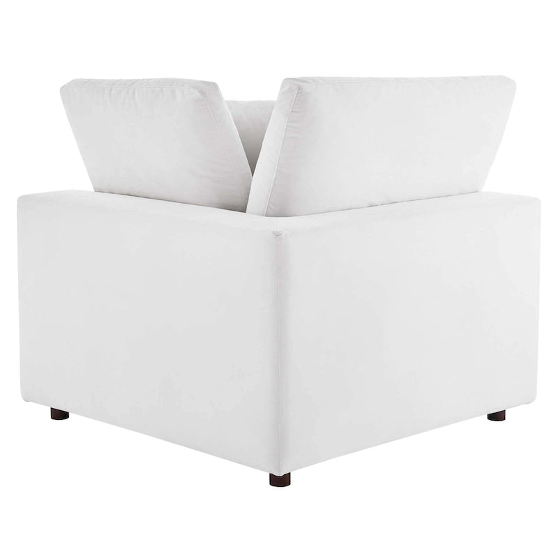Fauteuil d'angle Commix en velours performant, rembourré de duvet et ultra-confortable
