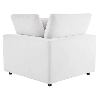 Fauteuil d'angle Commix en velours performant, rembourré de duvet et ultra-confortable