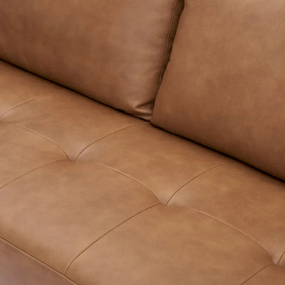 Fauteuil en cuir de vachette haut de gamme avec coussins haute densité et grand espace d'assise