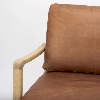 Fauteuil d'appoint Raeleigh en cuir véritable marron cognac avec structure en hêtre massif marron clair - 71 cm (L) x 86 cm (P) x 87 cm (H)