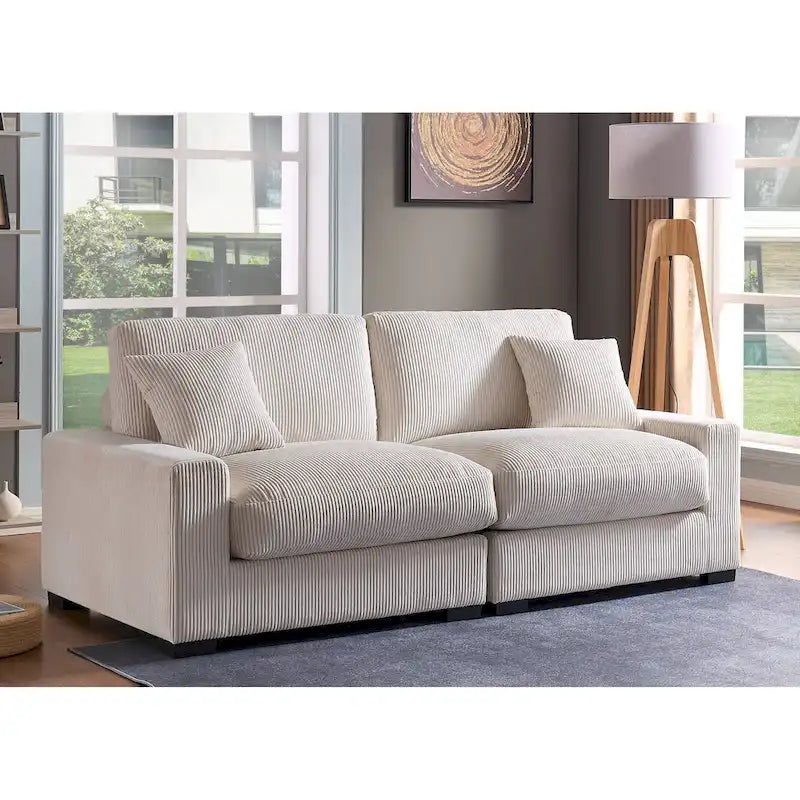 Canapé d'angle profond en velours côtelé avec pouf et coussins